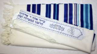 Before putting on a tallit, it is a customary tradition to kiss it and 