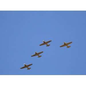  The Canadian Harvard Aerobatic Team Fly in Formation at an 