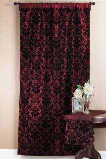  of 100% polyester, features a classic damask flocked design in black