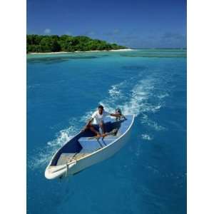 Man Driving Small Boat, Maninita Island, VavaU Group, Tonga, Pacific 