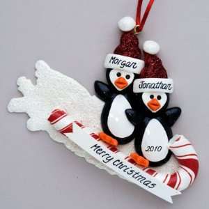  Penguin couple on Toboggan Personalized Christmas Ornament 