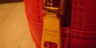 NWT Authentic PRADA orange cosmetic case purse bag Saks  