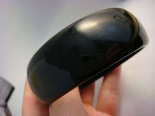 This auction features Big Wide Heavy Blacky Bakelite Bangle Bracelet 