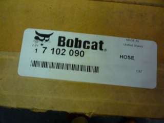 HERES A BOBCAT 7102090 LARGE HYDRAULIC HOSE NEW. Expensive hose 