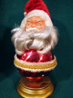   in argentina by puky c 1970 has metal body vinyl head with plush santa