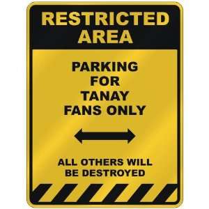  RESTRICTED AREA  PARKING FOR TANAY FANS ONLY  PARKING 