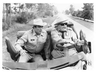 SMOKEY AND THE BANDIT still J. Gleason/son in car a013  