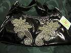Charm and Luck crystal embellished black patent leather handbag