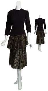  little black dress has fitted bodice with long sleeves, drop waist 
