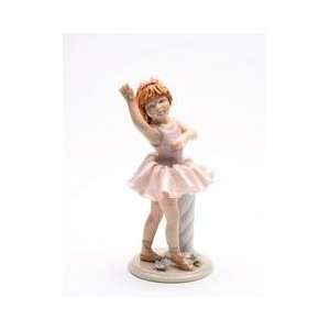  Girl Ballerina Pirouette in Pink Robe with Right Arm Up 