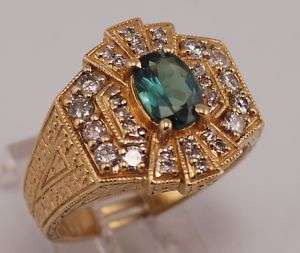 14 karat, solid yellow gold alexandrite/diamond ring  