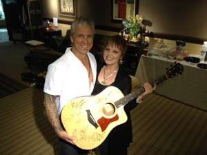210ce Taylor Guitar Autographed by Pat Benatar, Neil Giraldo, and more 