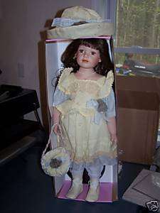 BUY 3 GET THIS ONE FREE PORCELAIN DOLLS.  acd  