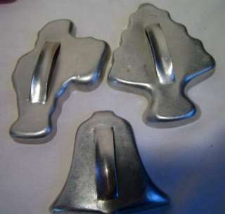 Holiday cookie cutter, measuring spoons, pie rim covers  