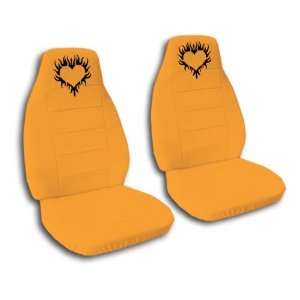 com 2 orange front seat covers with a black flaming heart. 2002 Mini 