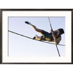  Low Angle View of a Young Man Pole Vaulting Superstock 