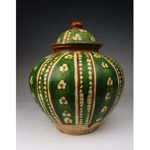 one Tri colored Pottery Pot With Stitched Football Pattern the people 
